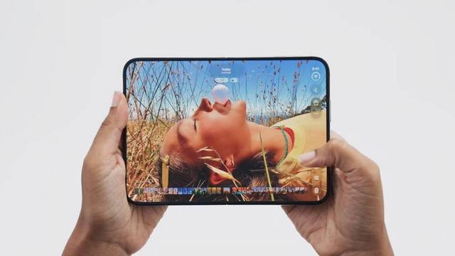 Header image for an article titled: A Broken iPhone Duo Could Cost Up to $1,499 to Repair